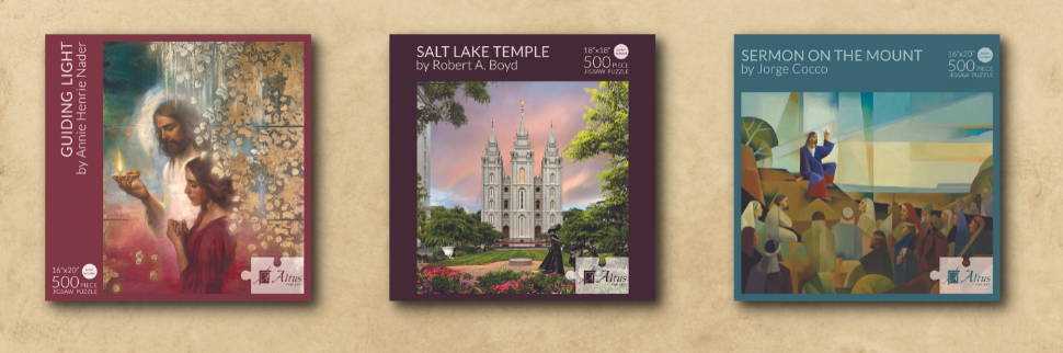 Banner image featuring three boxes of LDS art puzzles.