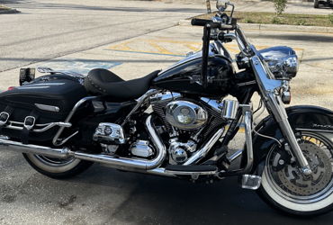2011 HARLEY-DAVIDSON FLHRC ROAD KING CLASSIC (BLACK) motorcycle for rent near Clearwater, FL