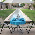 blue panama outdoor tablecloth on a round table