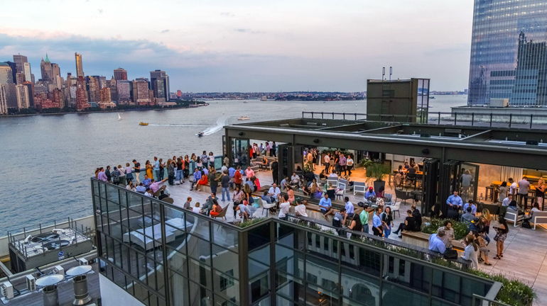 Beautiful panoramic views of the Manhattan skyline from Rooftop at Exchange in Jersey City.