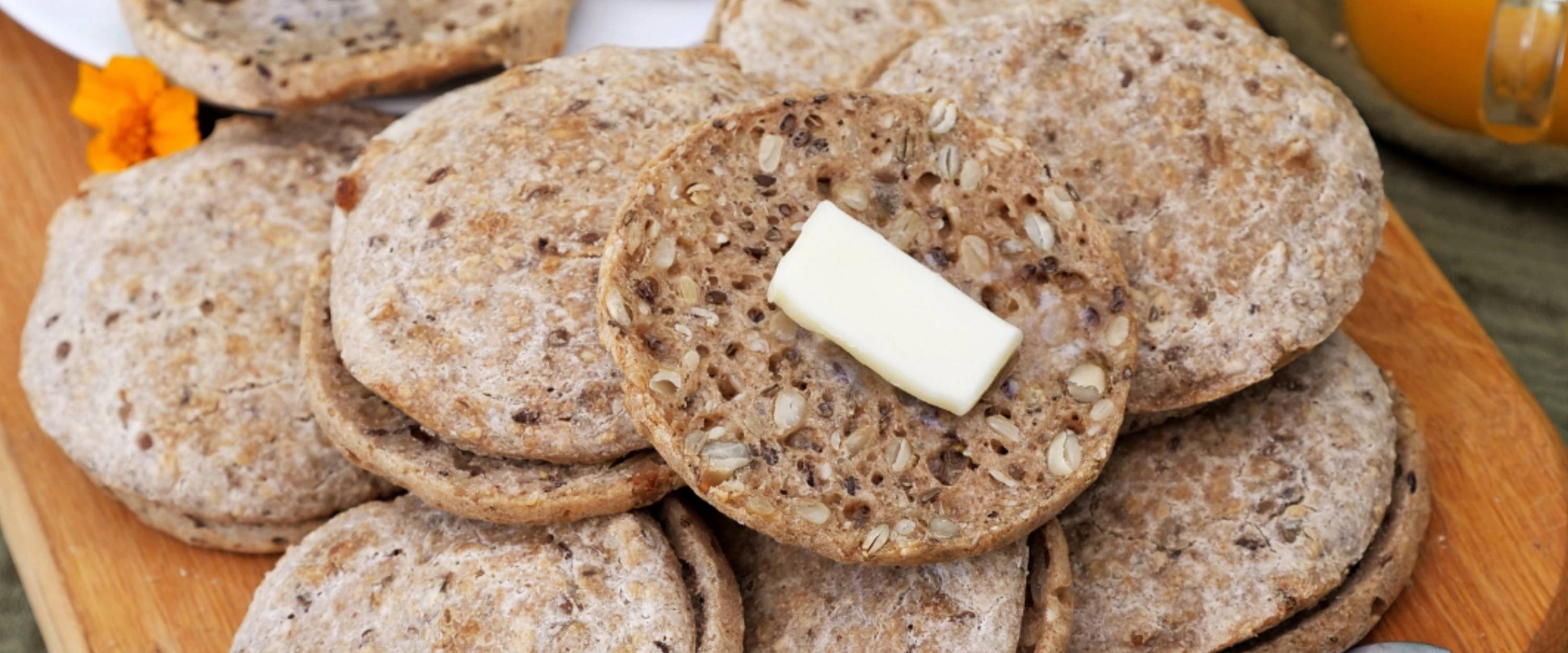 PACHA English Muffins with butter on top.