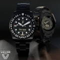 42mm Classic in DLC-Black with custom black bezel featuring crossed rifles and the punisher logo.