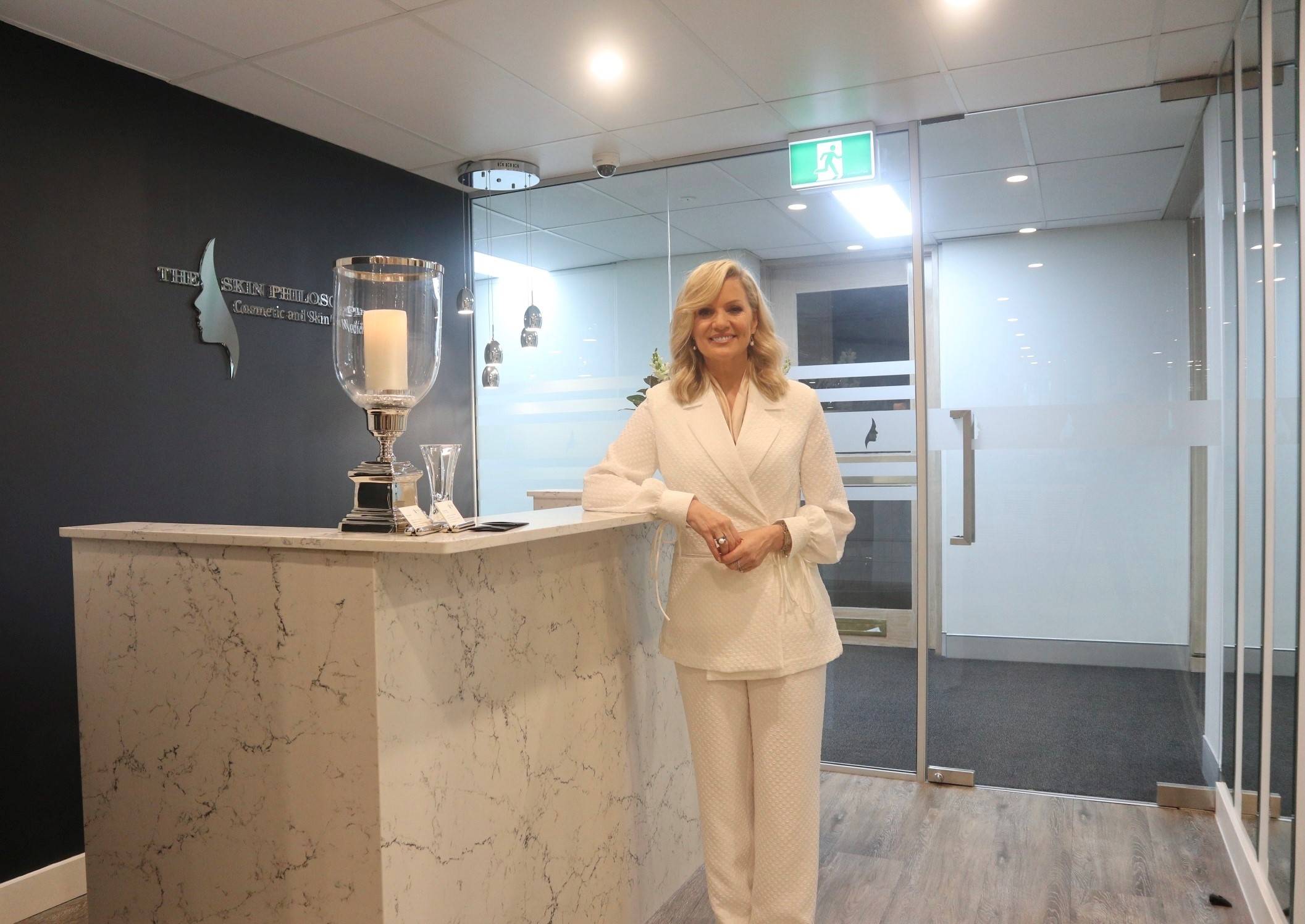 girl using face cleanser at skin clinic Sydney