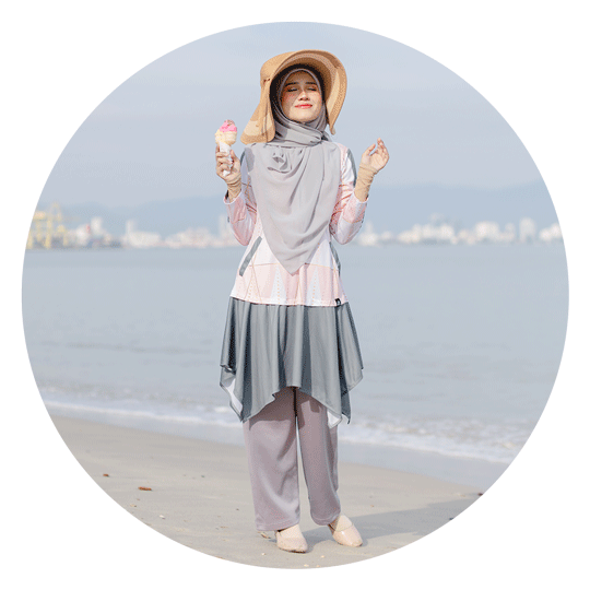 a muslim women holding an icecream