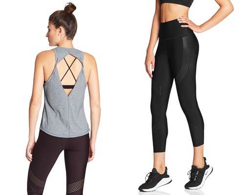 Back of woman wearing grey cut out vest with strappy sports bra detailing and woman wearing black sustainable high rise compression leggings