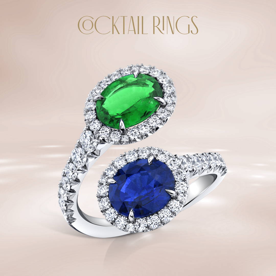 Embrace ring with sapphire, emerald and diamonds