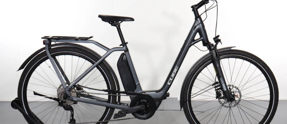 A silver Cube Town Hybrid One electric bike