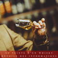 Homme tenant dans la main un verre de dégustation de Whisky penché pour admirer sa teinte