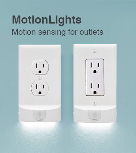 Two outlet lights with motion sensors on a teal wall