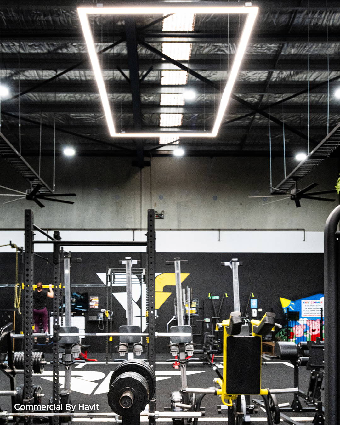 LED Custom made Pendant by Havit Commerical, illuminating the interior of a gym.