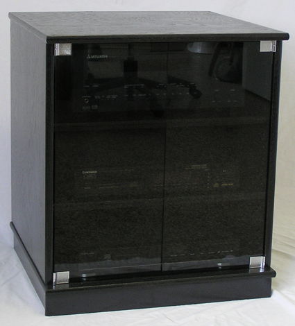 Black oak stereo cabinet with gray tint glass doors.