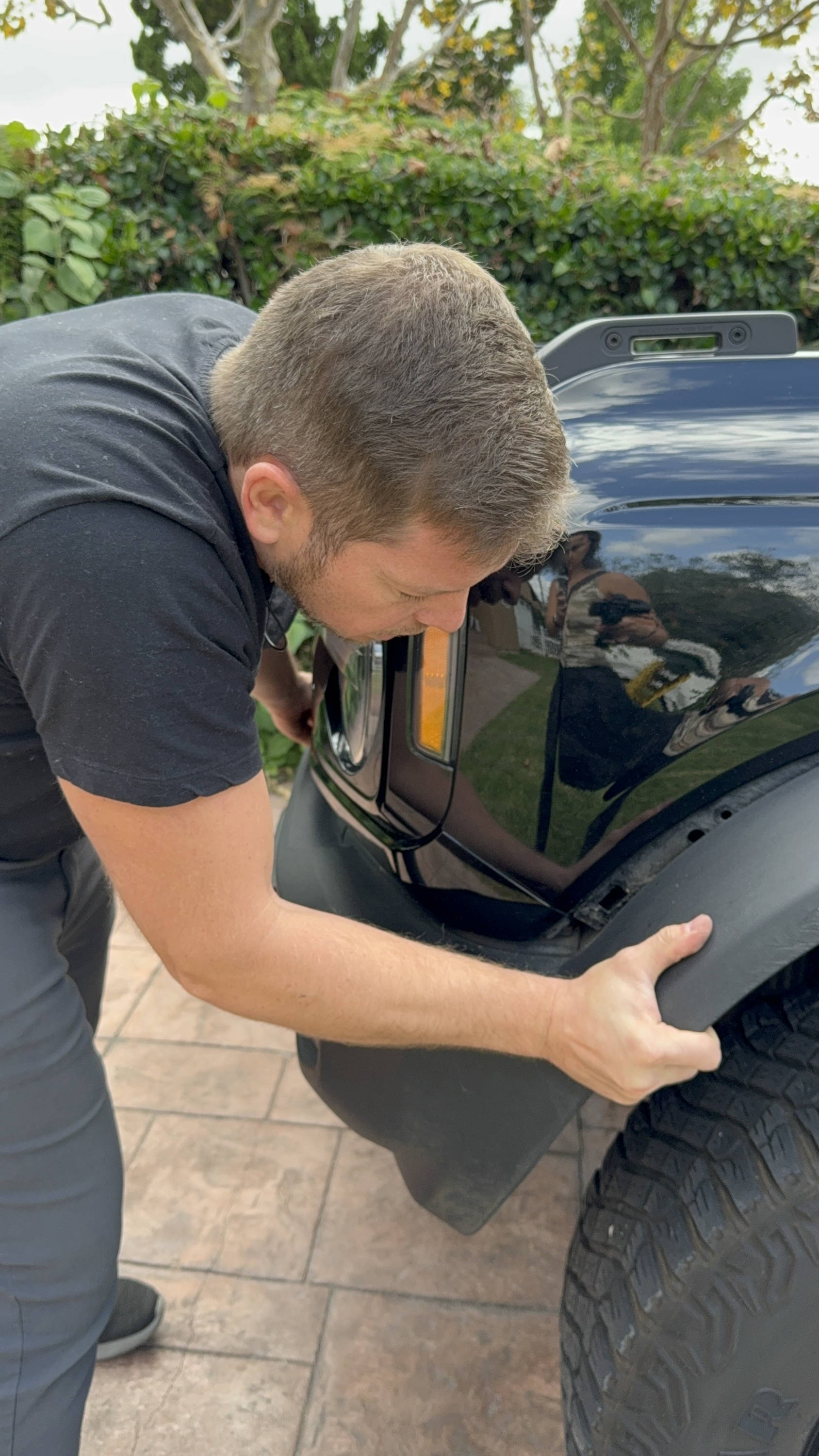 mike removing bottom grille from ford bronco 