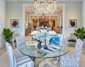 coastal  dining room with oyster shell chandelier