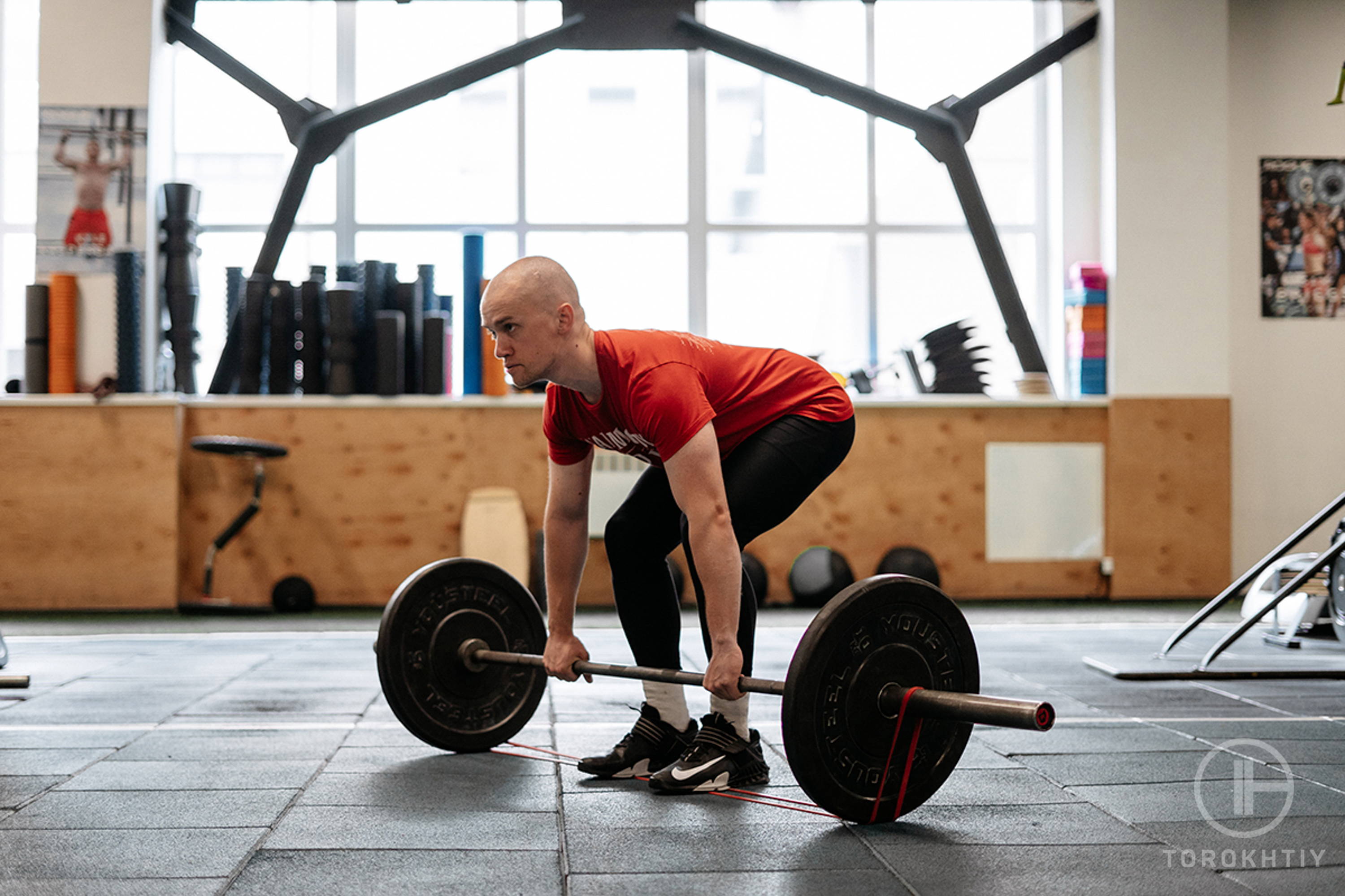 athlete training with barbell