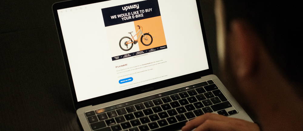 a laptop showing the Upway e-Bike website