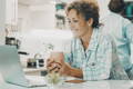 woman shopping on laptop