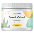 a jar of Brightcore's Sweet Wheat, a high-quality, organic wheat grass juice powder