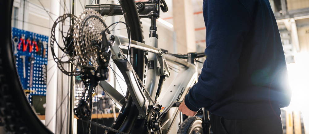 Repairing electric bike in stand