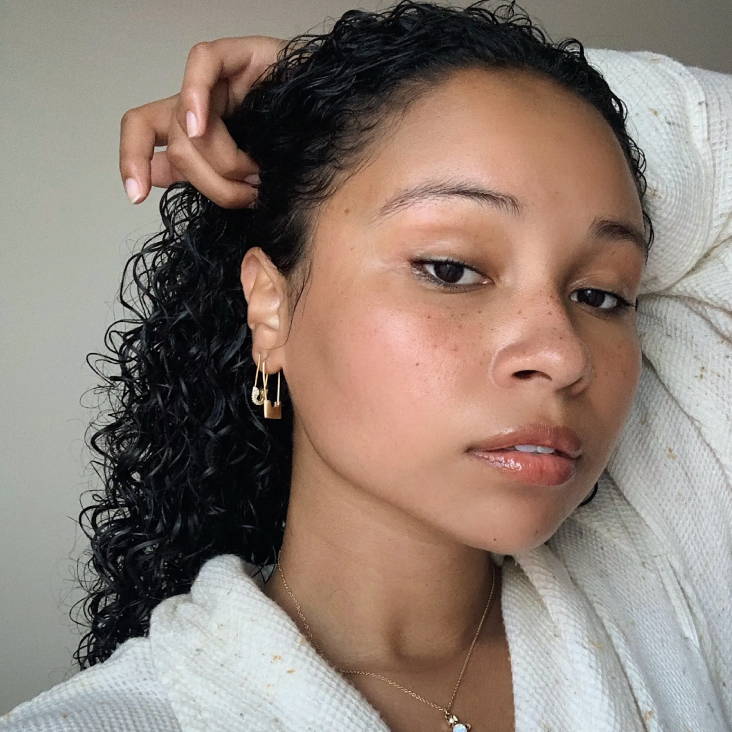 woman with dark curly hair