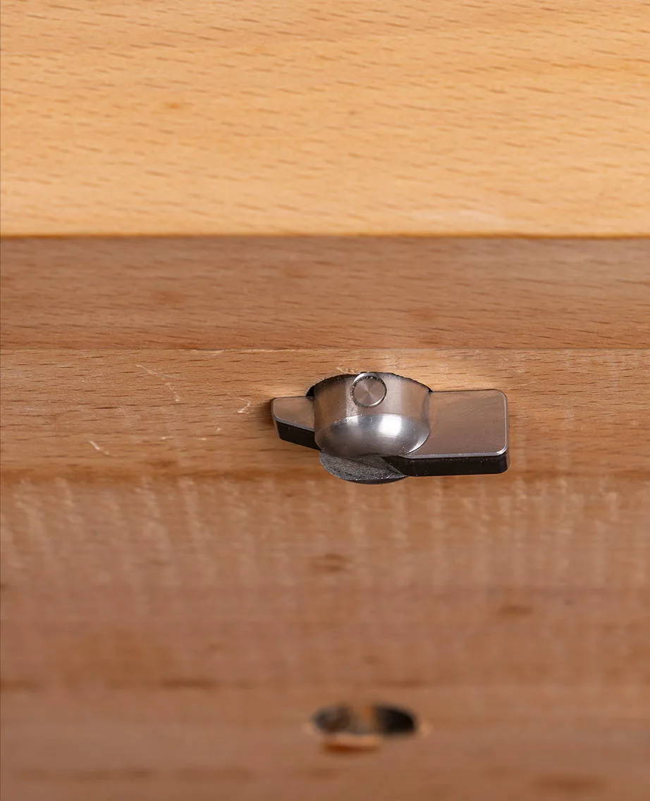 Secure the harvey Compass AH 3 Arch Hold Down while the mechanism is latched to the underside of the workbench