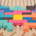 Close up on colorful Tetris-like blocks of the Montessori Brain Blocks set.