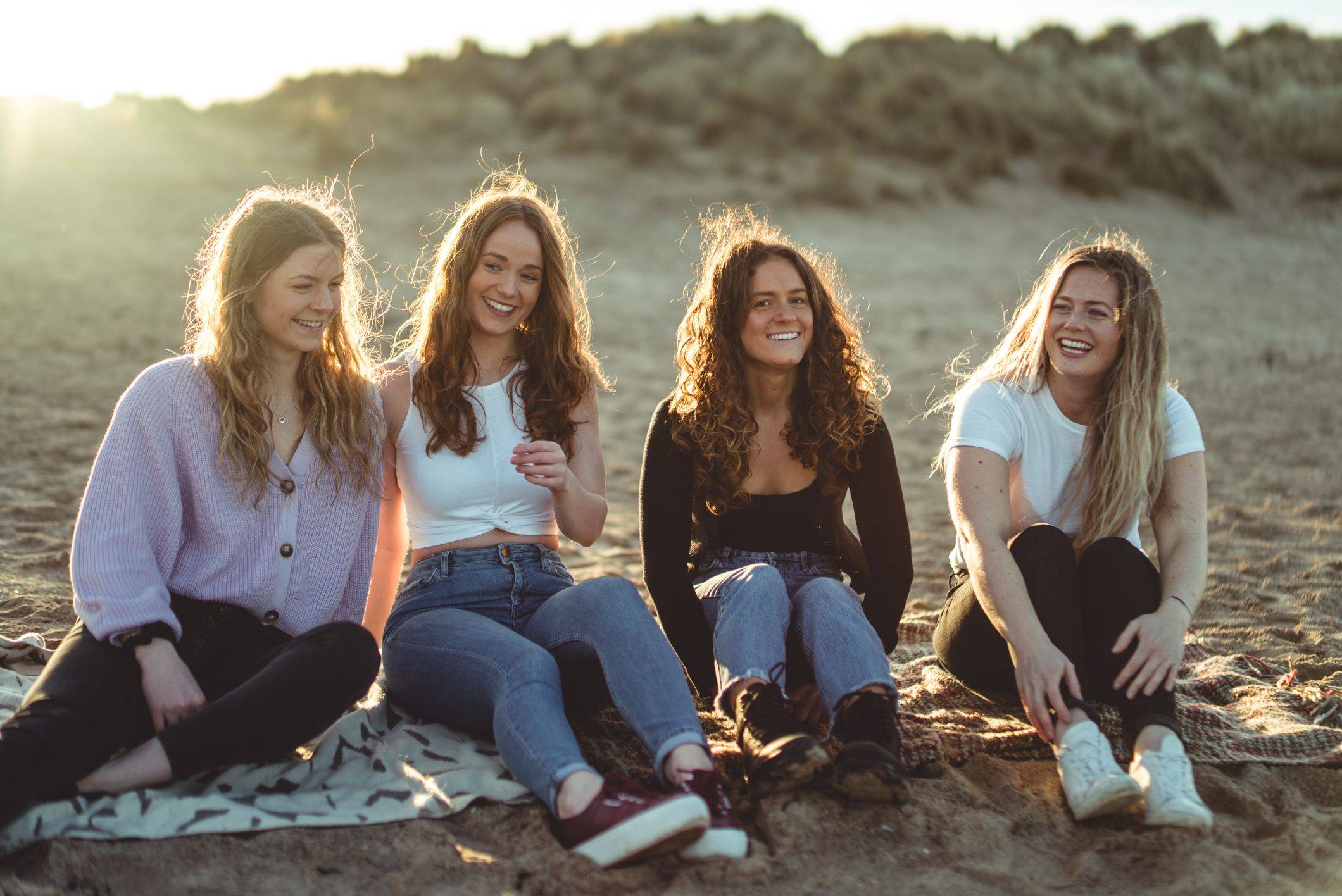 Image of girls sitting on beach