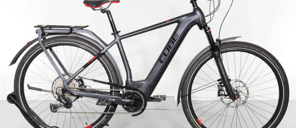 a Cube Kathmandu Hybrid 45 front suspension electric city bike