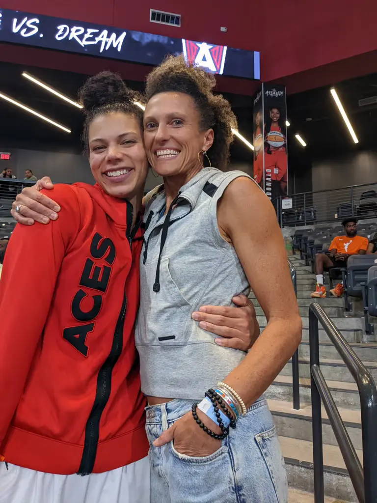 Image of Brooke and Alysha Clark at a WNBA game 