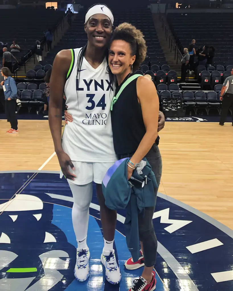 Photo of Brooke and Sylvia Fowles at a basketball game 
