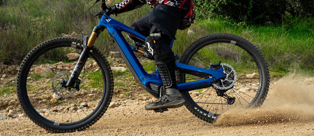 Mountain biker skidding an e-MTB