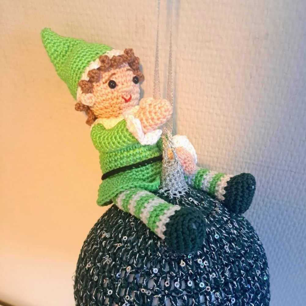 Elf on a Christmas ornament or LED lamp