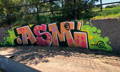 remove graffiti from exposed aggregate
