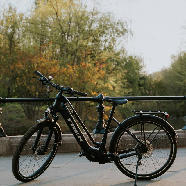 a black Trek Allant electric city bike