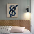 abstract knot print above a bed