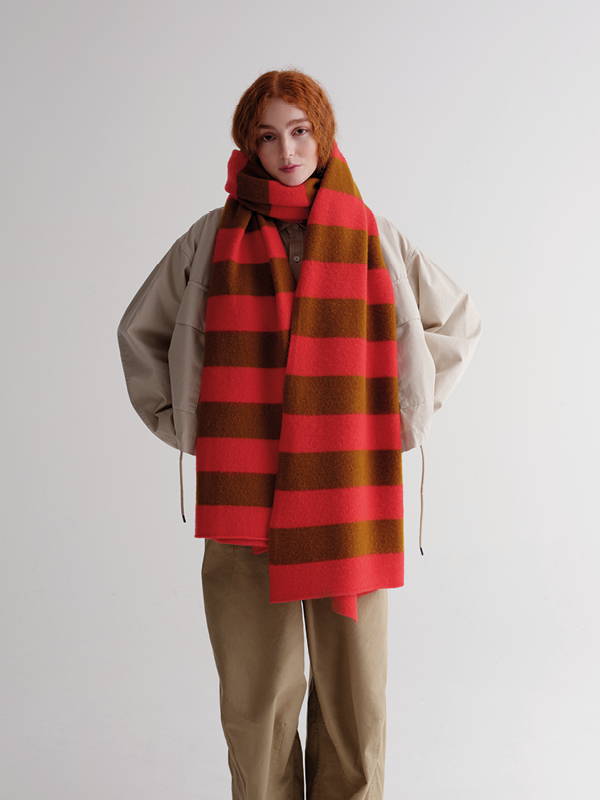 model wears   Stripe Brushed Blanket Scarf Poppy & Cumin