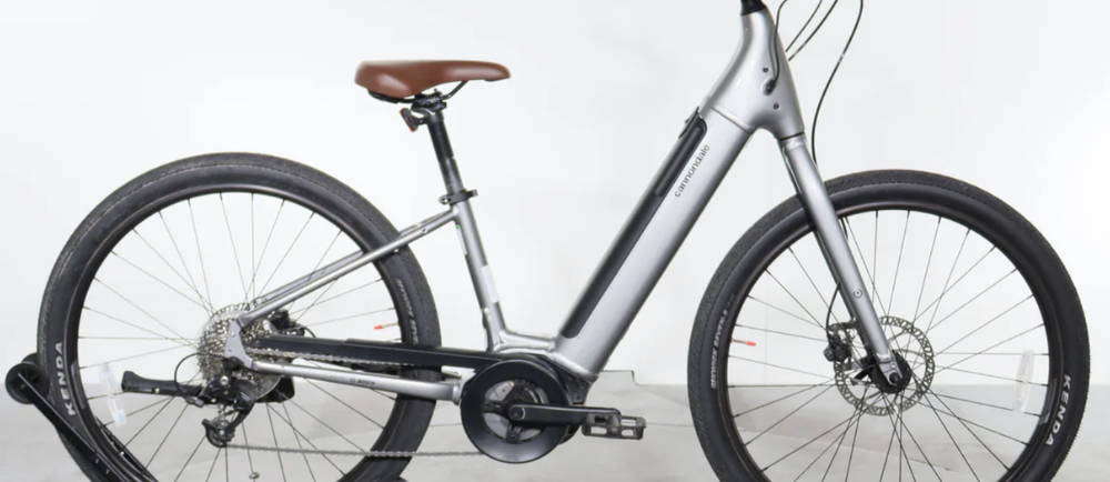 a silver Cannondale Adventure Neo 4 electric commuter bike
