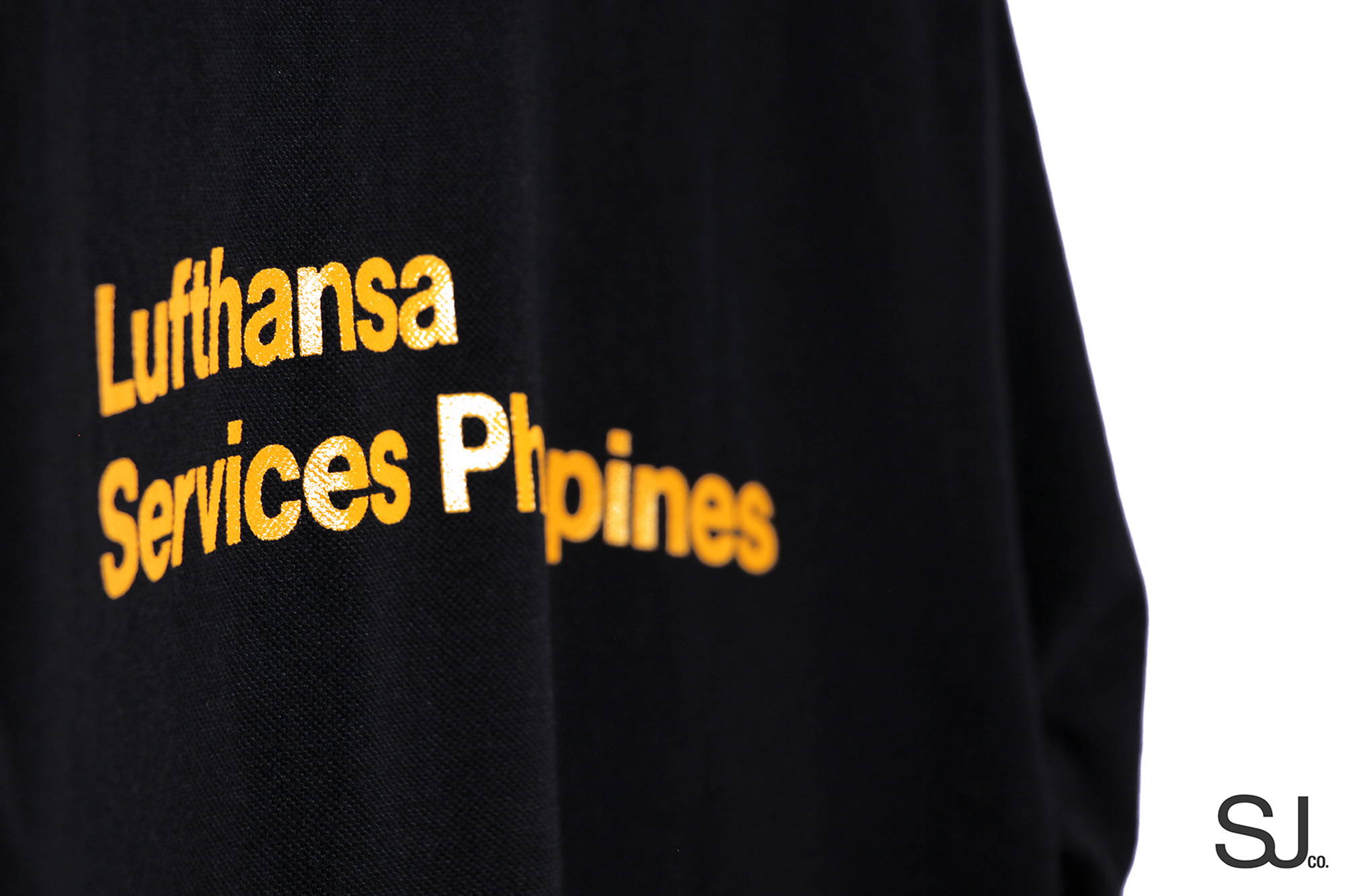 screen printing method on Lufthansa client order black honeycombed polo shirts sj clothing manila printing philippines