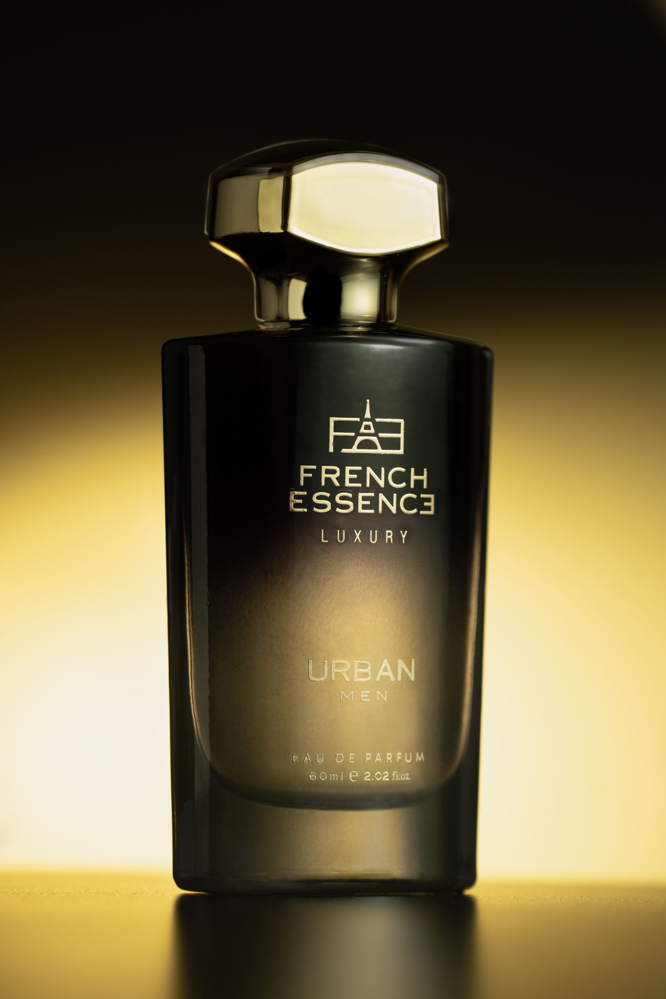 A bottle of French Essence Luxury Urban Eau de Parfum for Men. The bottle is a sleek black glass with a silver cap