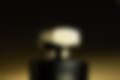 A bottle of French Essence Luxury Urban Eau de Parfum for Men. The bottle is a sleek black glass with a silver cap