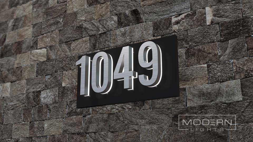 Black plaque stone wall