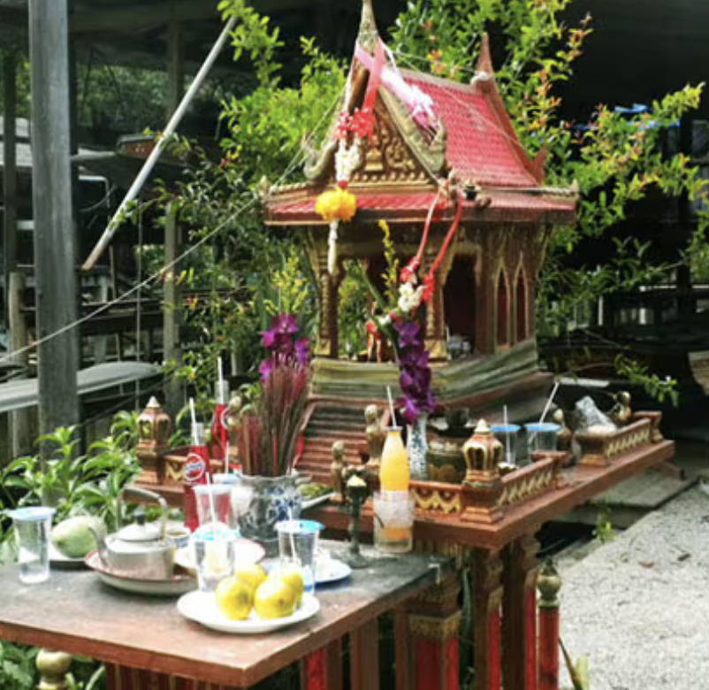 thai spirit house in wood