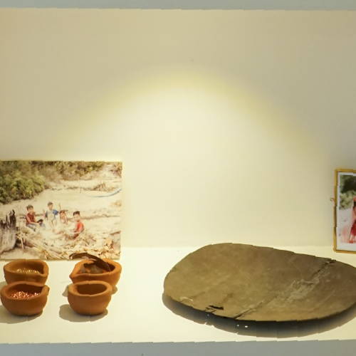 real wooden pan used by artisanal and small scale gold miners Indonesia displayed in jewelry showroom