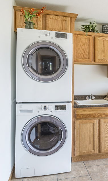 ENCLOSED STACKED WASHER AND DRYER ENCLOSED STACKED WASHER AND DRYER