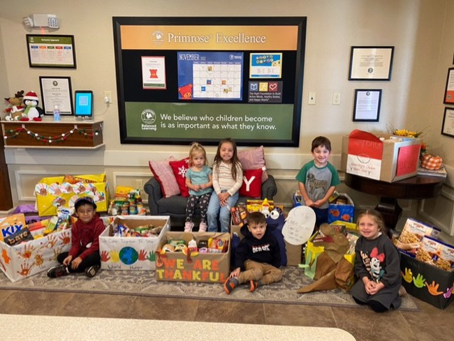 Photo of Primrose students with food donations