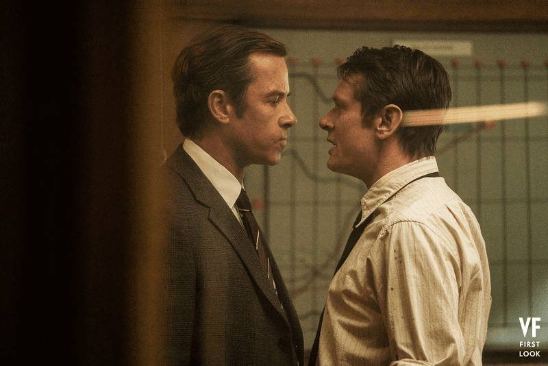 Image may contain: Guy Pearce, Jack O'Connell, Accessories, Formal Wear, Tie, Clothing, Coat, Adult, Person, Suit, and Shirt