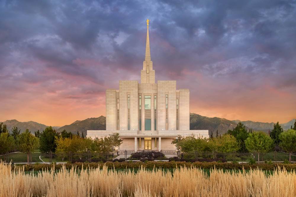 LDS art photo of the Oquirrh Mt Temple against a stormy sky. 