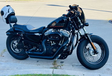 2012 HARLEY-DAVIDSON XL1200X FORTY-EIGHT (BLACK) motorcycle for rent near McKinney, TX