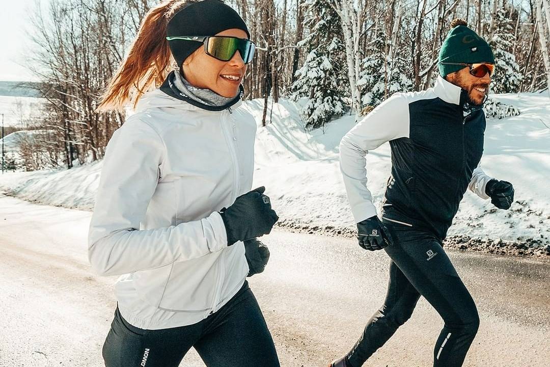 The couple are running in winter gloves