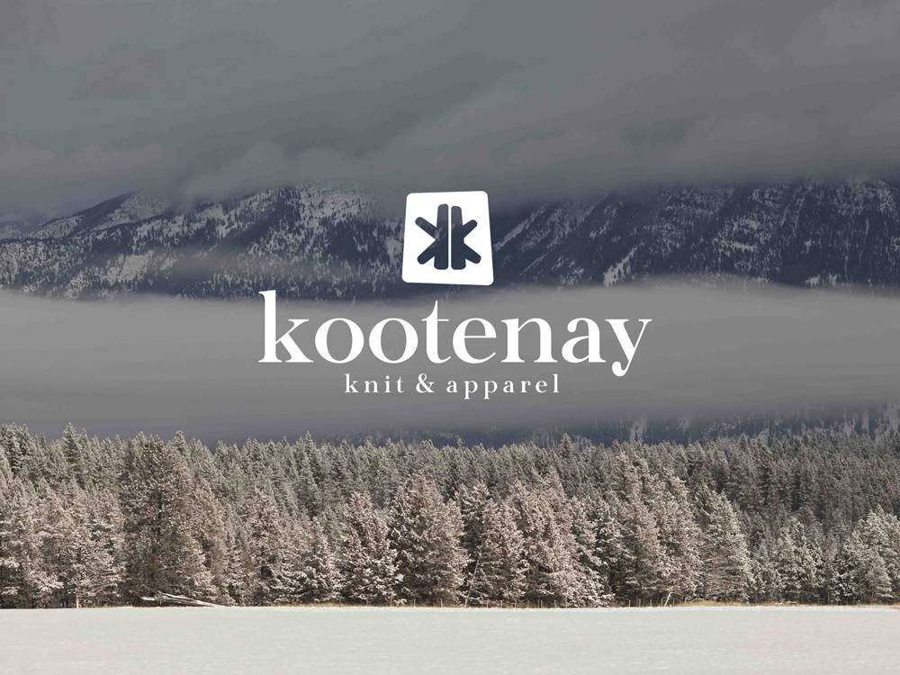 Couple wearing Kootenay Knit beanies with custom branded labels