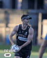 Norths Devils Player wearing an EV2 Sportswear Customisable Visor and Training Singlet
